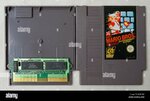 opened-cartridge-for-nintendo-nes-game-console-super-mario-bros-HC8E4W.jpg